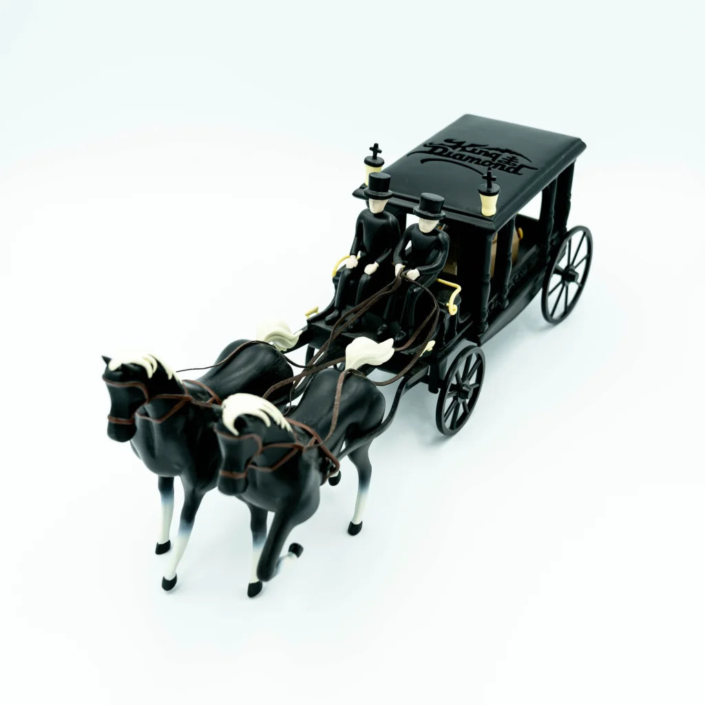Black horse-drawn carriage toy with two horses and drivers from King Diamond ccc set