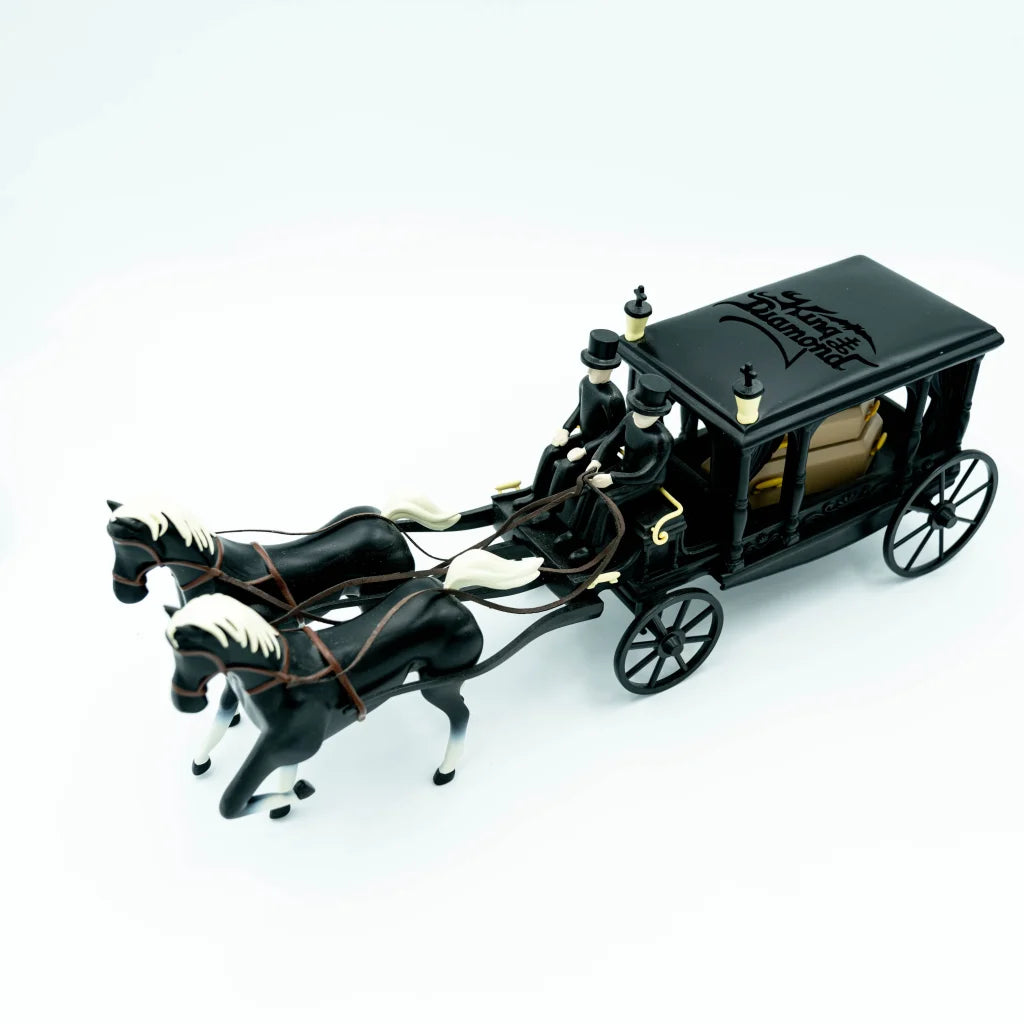Black horse-drawn hearse toy with two horses and drivers from King Diamond ccc set