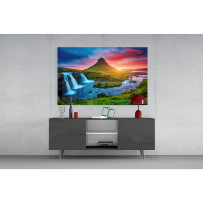 Stunning Iceland waterfall glass wall art with fiery sunset vibes