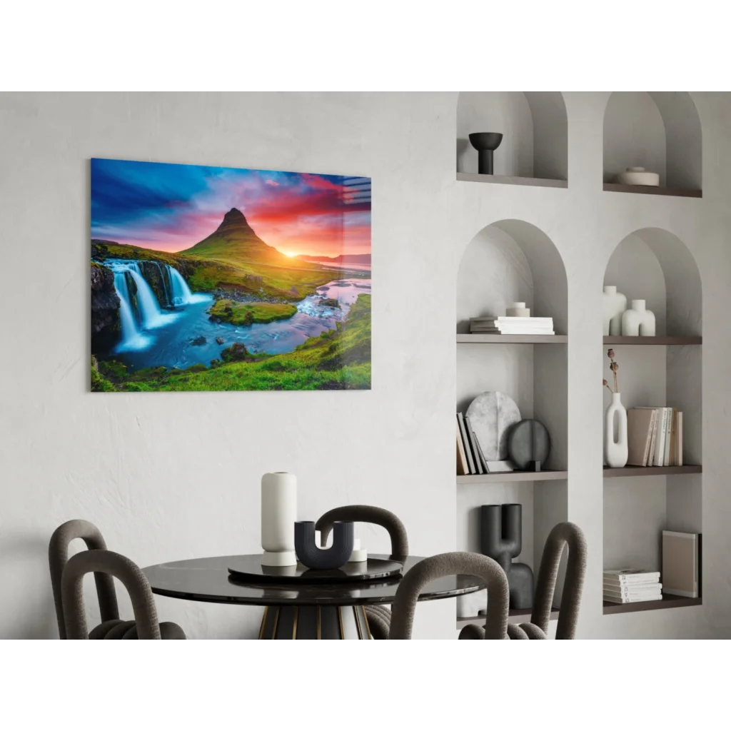 Vibrant glass wall art of Iceland waterfall under fiery sunset sky