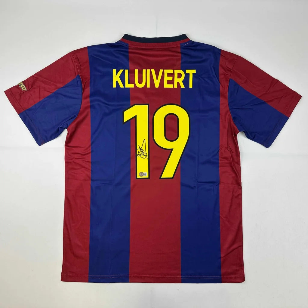 Kluivert signed Barcelona jersey with red and blue stripes, yellow lettering, adidas logo