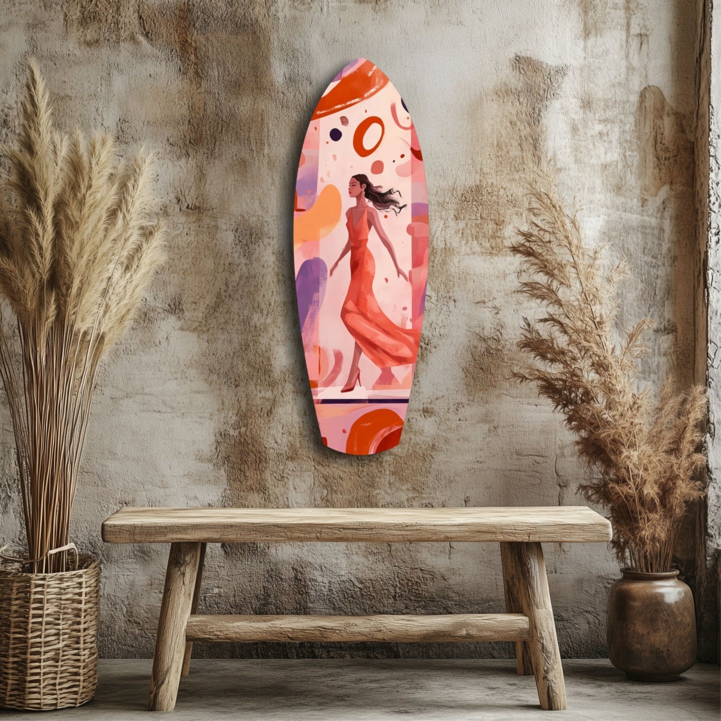 Oval glass wall art featuring a woman in a flowing red dress against pink and purple abstract shapes, displayed above a wooden bench between dried grasses.