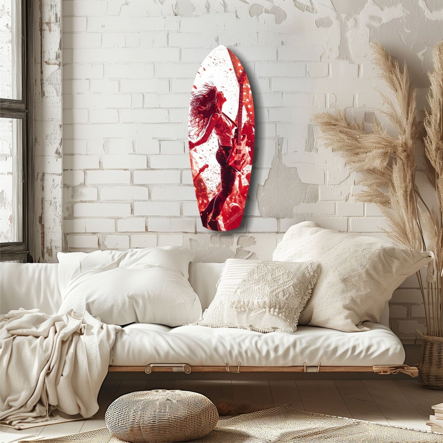 Red and white glass wall art featuring an abstract figure displayed above a cream upholstered daybed in a minimalist bedroom.