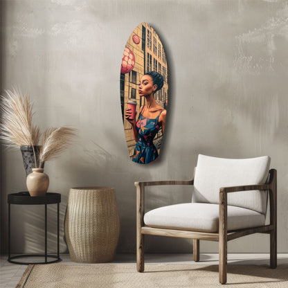 Oval glass wall art depicting a woman in blue dress holding red object before urban building backdrop, displayed above wooden chair in modern interior.