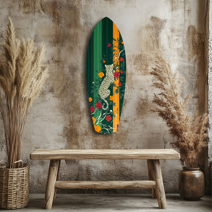 Green glass wall art panel featuring a white leopard surrounded by orange and red flowers, hanging above a wooden bench in a styled interior.