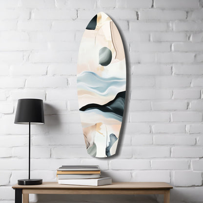 Abstract sailing glass wall art mounted on white brick above wooden desk with black lamp and stacked books.