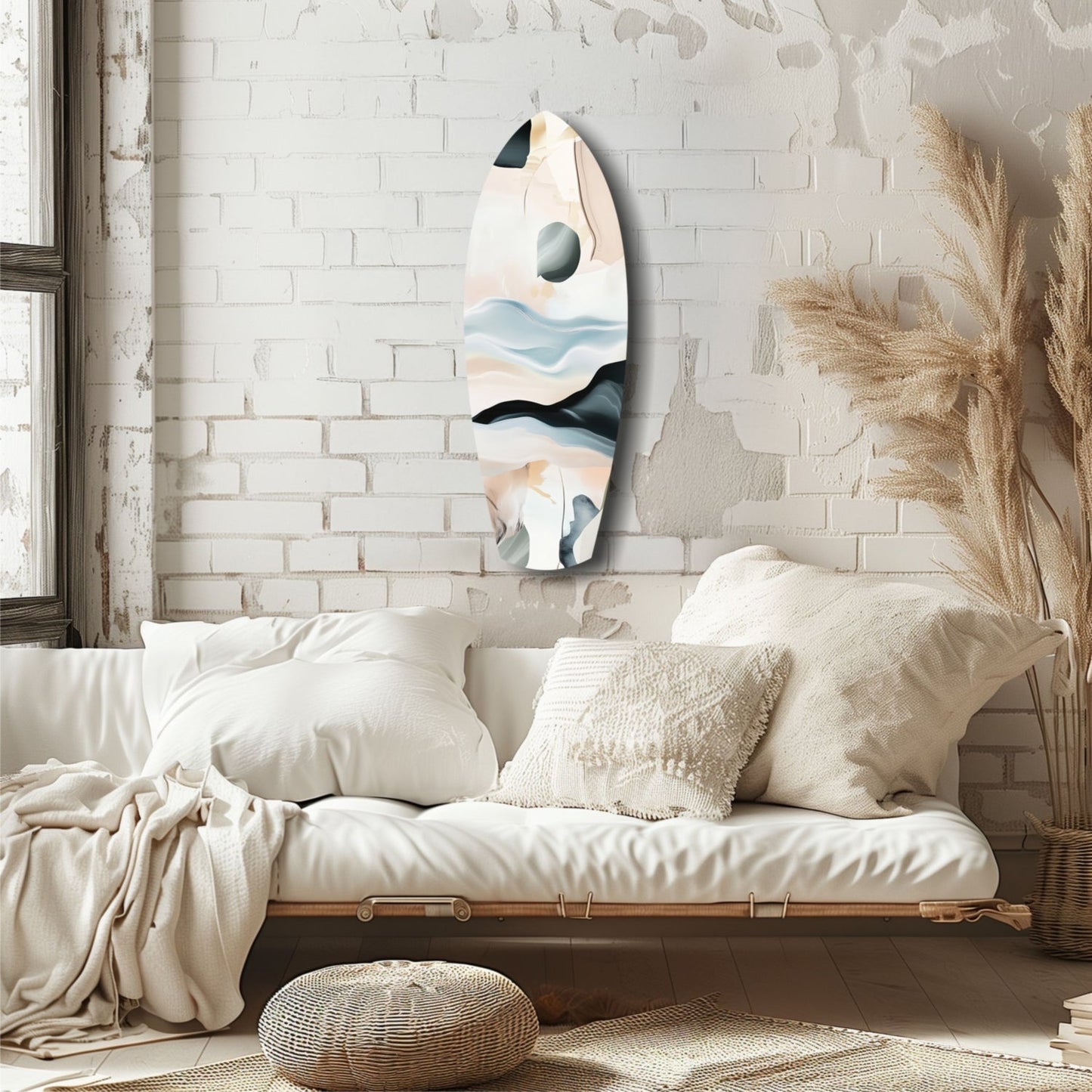Abstract sailing glass wall art with layered blue, black, and cream tones displayed above a cream bedroom sofa.