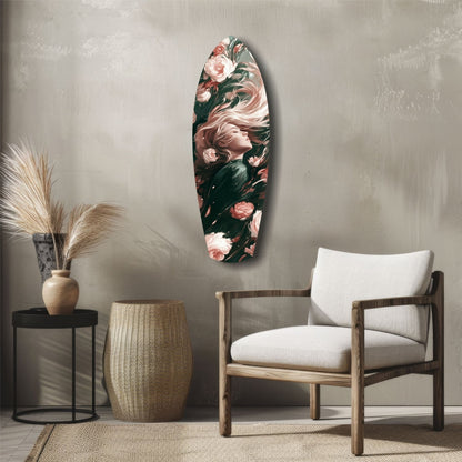 Blooming Breeze glass wall art displayed vertically above a wooden chair, featuring a woman's profile surrounded by pink roses on dark green background.