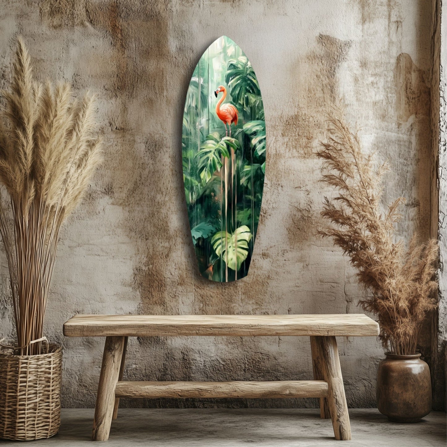Elongated oval glass wall art depicting a red flamingo among green tropical foliage, displayed above a wooden bench in a rustic interior setting.