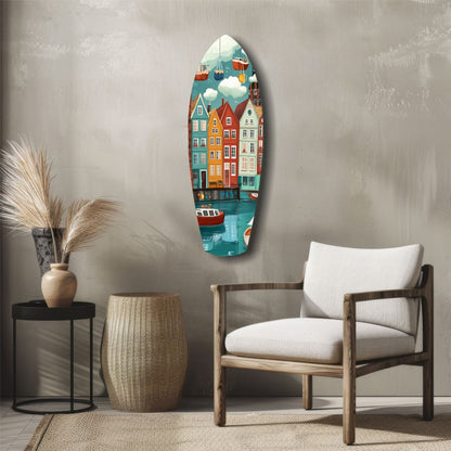 Oval glass wall art depicting colorful coastal buildings and boats hung above wooden chair in minimalist interior setting.