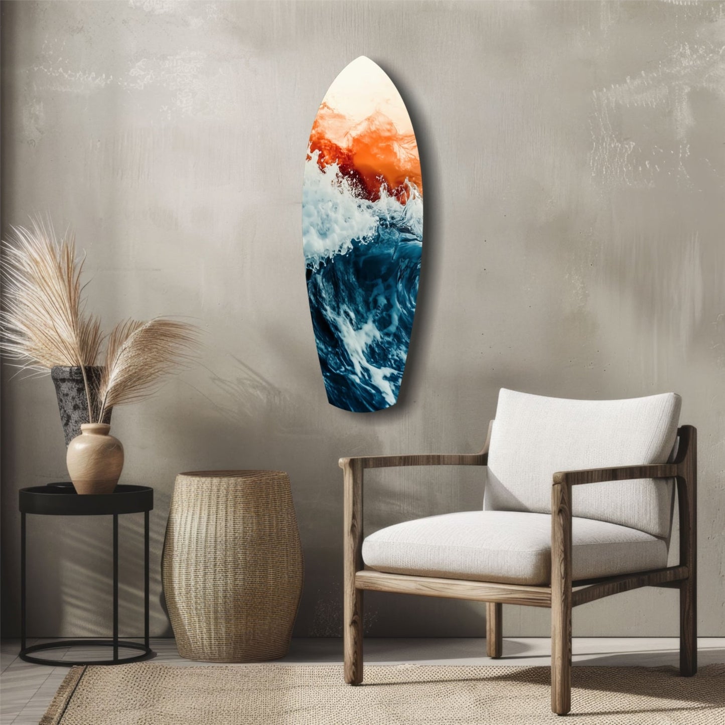 Surfboard-shaped glass wall art displaying ocean waves in blue and white with orange-red sunset tones, displayed in a minimalist room setting.