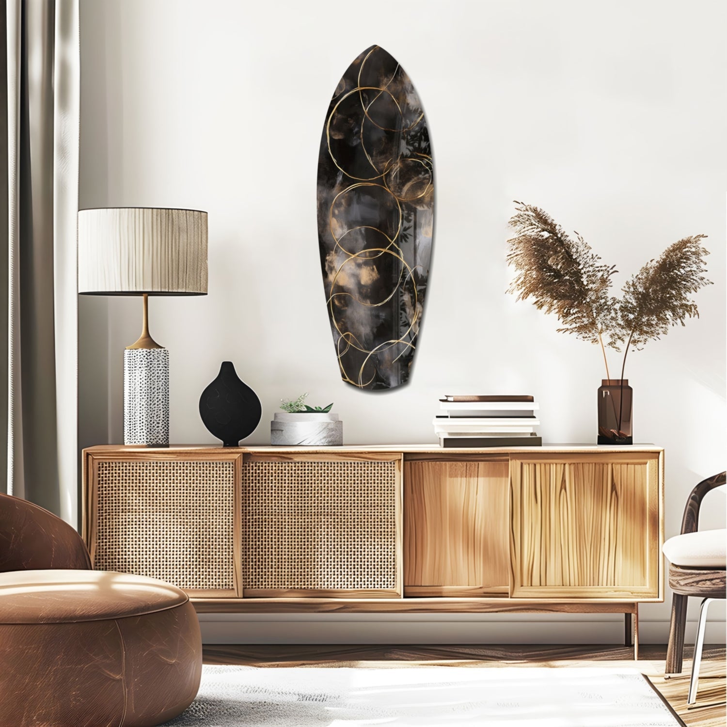 Black glass oval wall art with gold circular geometric patterns displayed above a wooden credenza in a modern interior setting.
