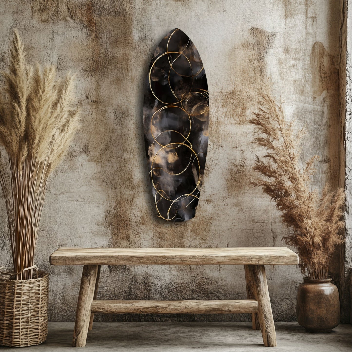 Black glass wall art with gold circular overlays displayed above wooden bench in rustic interior setting.