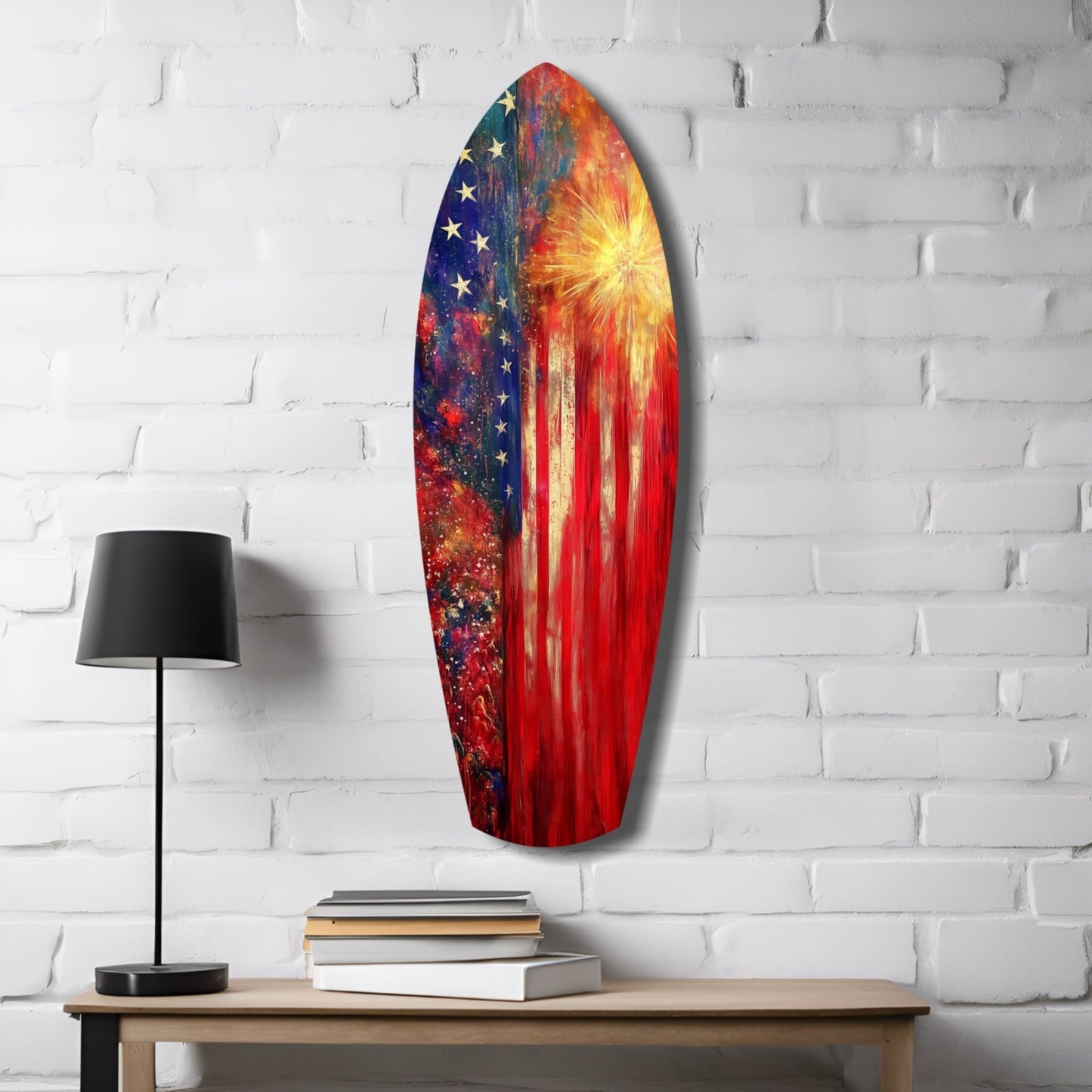 Oval glass wall art with American flag stars on dark blue left side and red and gold sunburst on right side, displayed above wooden table with lamp and books.