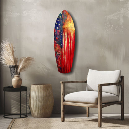 Patriotic surfboard-shaped glass wall art featuring American flag stars and red stripes with yellow sunburst, displayed in minimalist room setting.