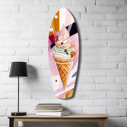 Oval glass wall art featuring a colorful ice cream cone with pink, white, and tan swirls displayed on white brick wall above wooden desk with lamp and books.
