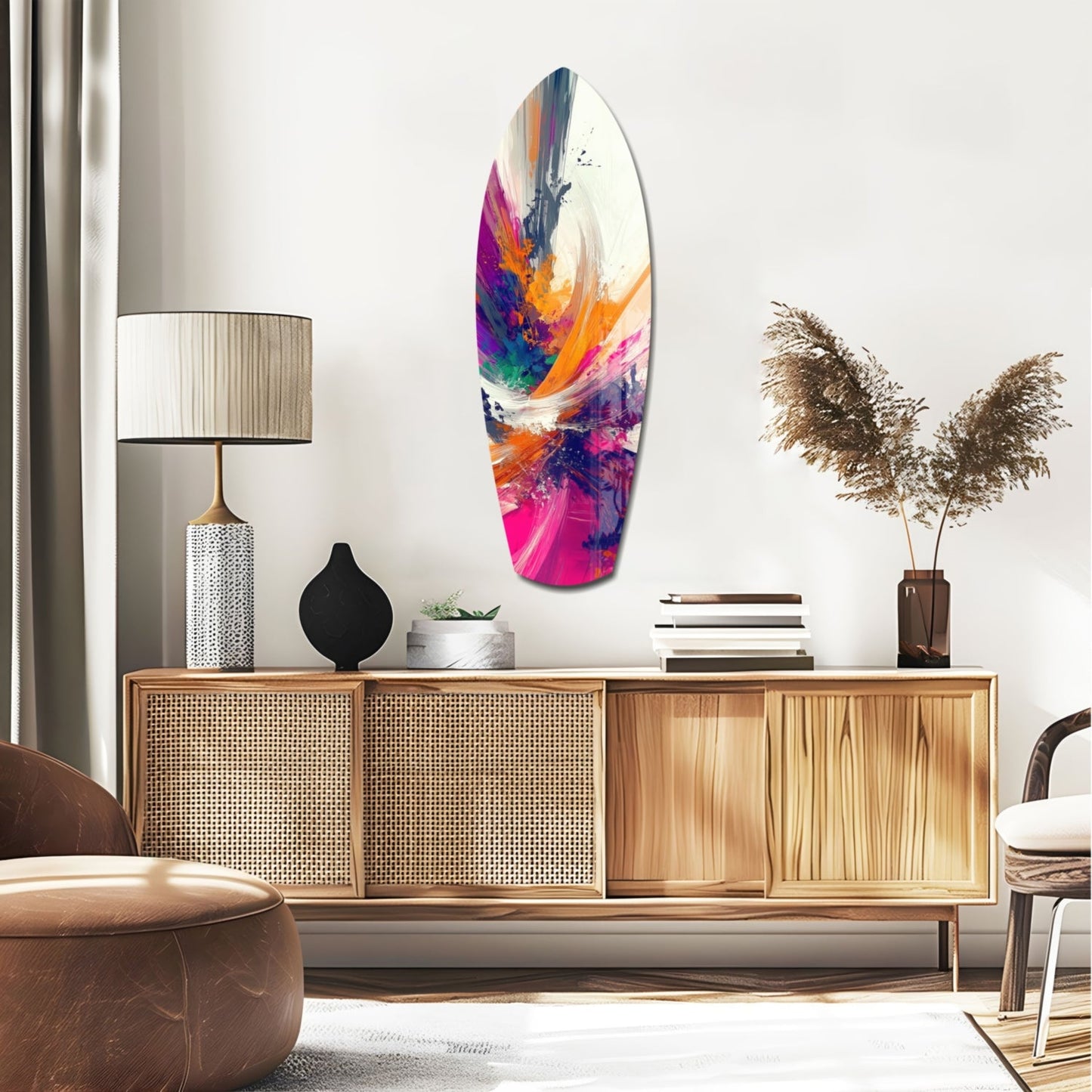 Colorful abstract glass wall art featuring vibrant paint strokes in pink, orange, blue, and purple displayed above a wooden mid-century credenza in a modern living room setting.