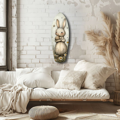 Cute rabbit glass wall art hung above a bed in a minimalist bedroom with white brick walls and neutral bedding.