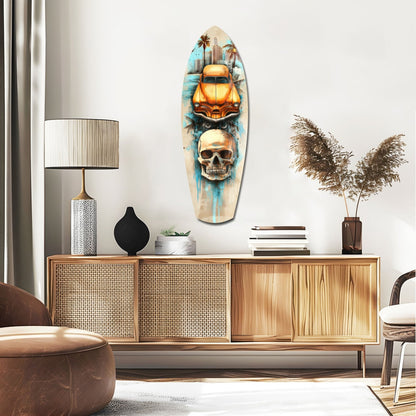 Surfboard-shaped glass wall art displaying yellow vintage car and skull imagery mounted above wooden mid-century credenza in modern living room.