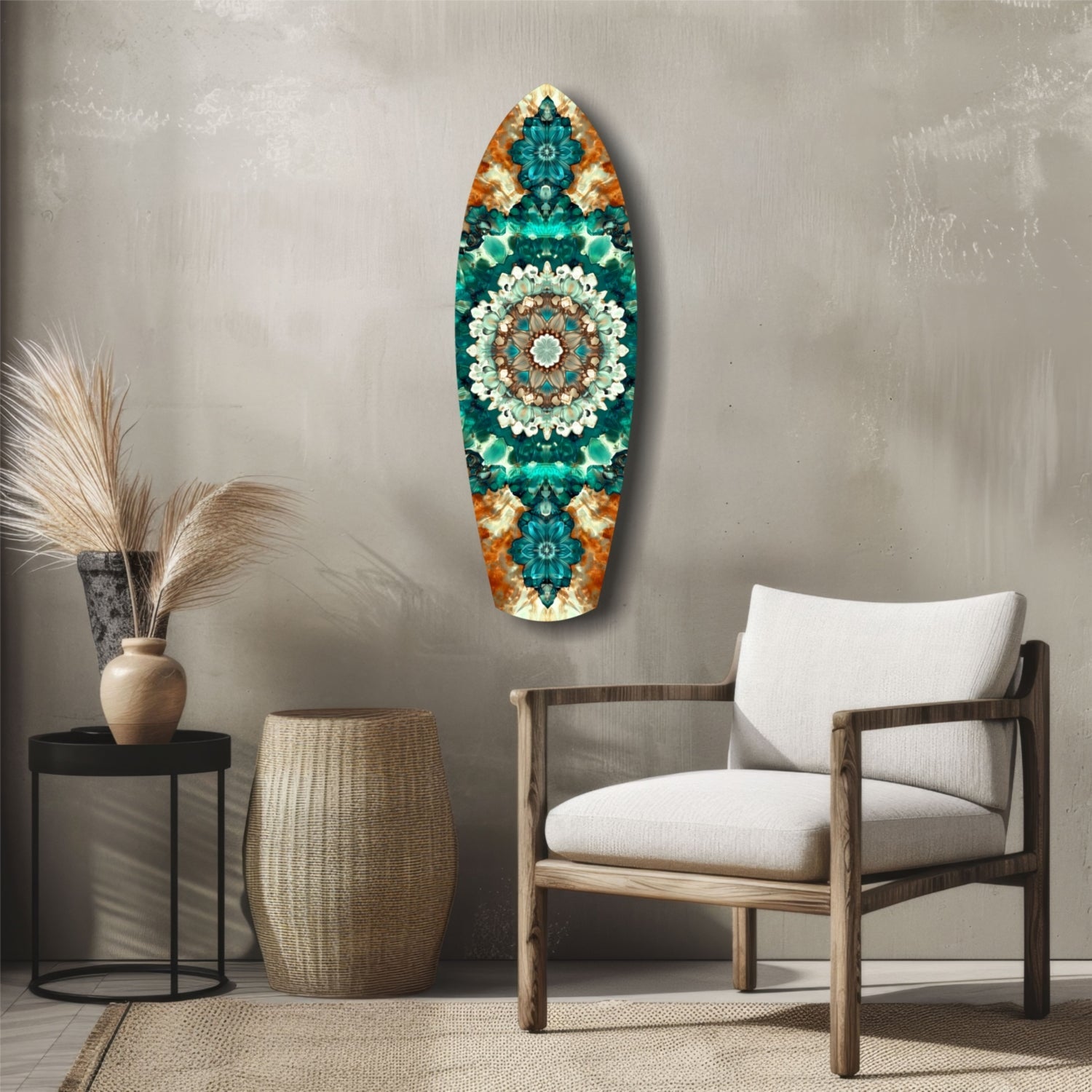Emerald Dreams Glass Wall Art displayed on a neutral wall above a wooden chair, showing teal, cream, and orange mandala pattern on elongated oval glass panel.