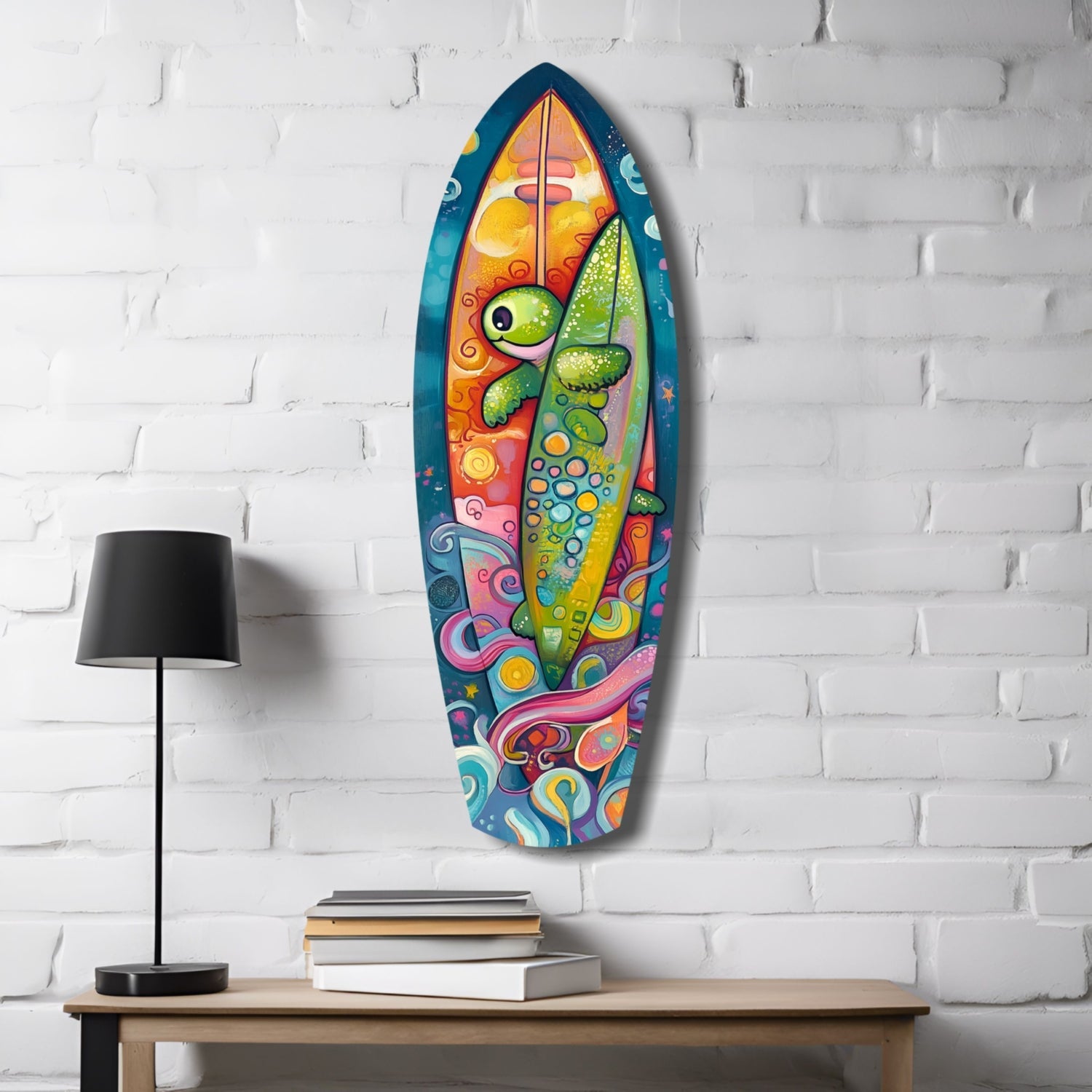 Colorful glass surfboard wall art depicting a stylized fish with yellow eye and green scales, displayed on white brick above wooden table with lamp and books.