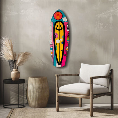 Colorful smiley surfboard wall art displayed above wooden chair in minimalist living room with neutral décor.