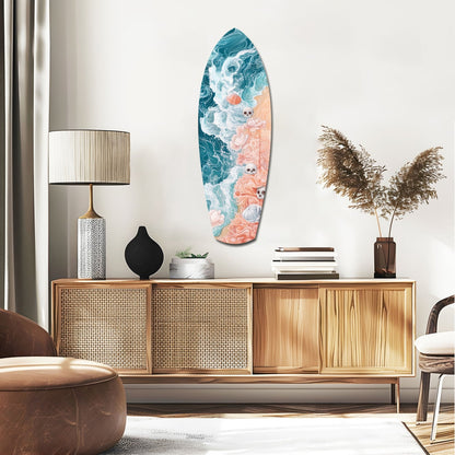 Eternal Tides glass wall art displayed above wooden credenza, featuring turquoise ocean waves and coral reef design.