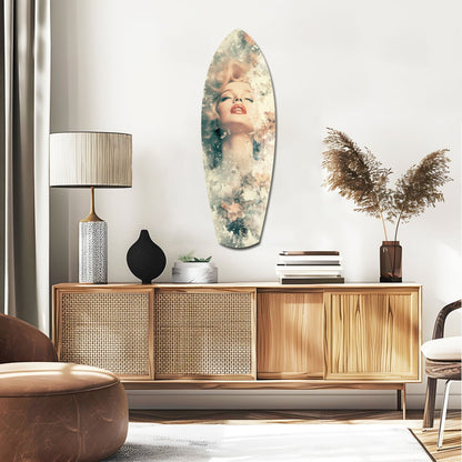 Oval floral glass wall art featuring a portrait of a woman with flowers in soft pastels, displayed above a wooden credenza in a modern living room.