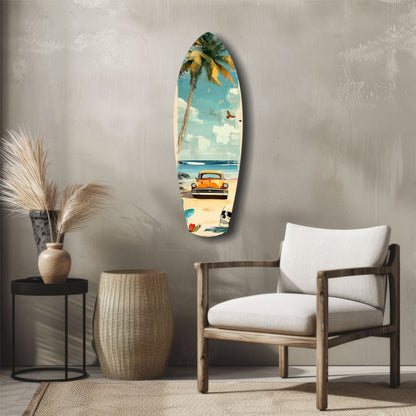 Surfboard-shaped glass wall art displaying vintage beach scene with orange car, palm tree, and blue sky, hung above wooden chair in modern interior.