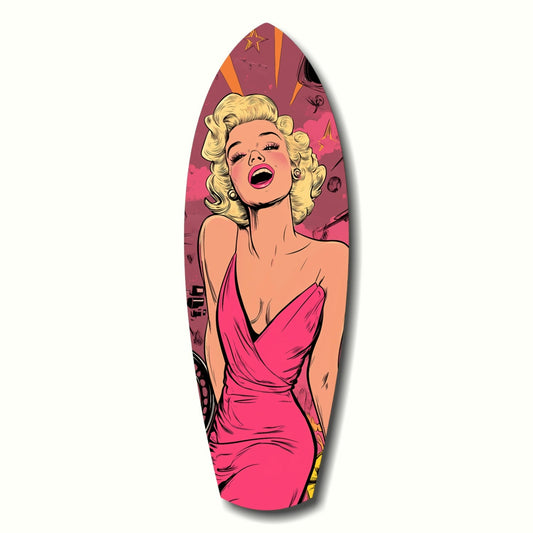 A surfboard-shaped glass art piece featuring a blonde woman in a pink dress against a burgundy and pink gradient background with gold accents.