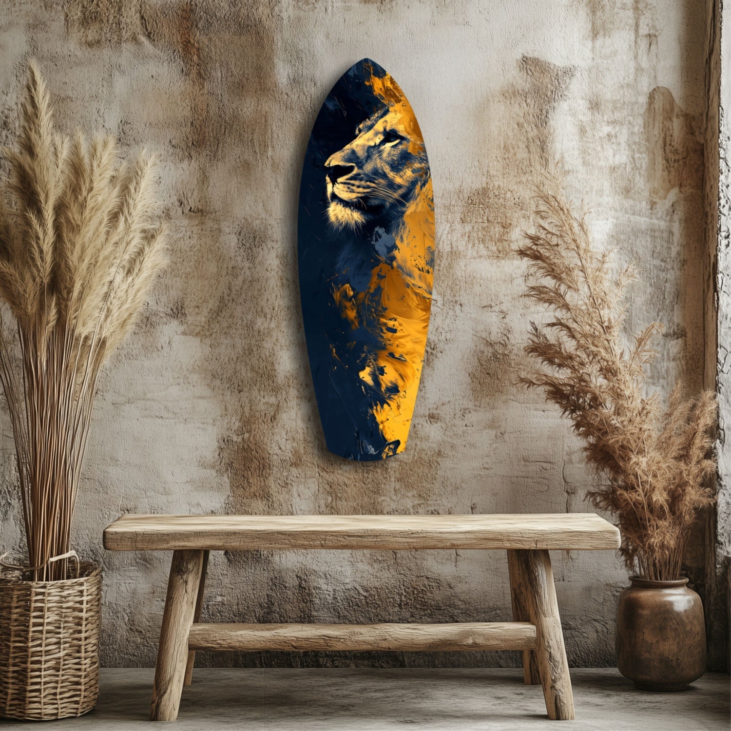 Blue and gold glass wall art depicting a lion's head, displayed above a wooden bench against a textured beige wall with dried grasses.