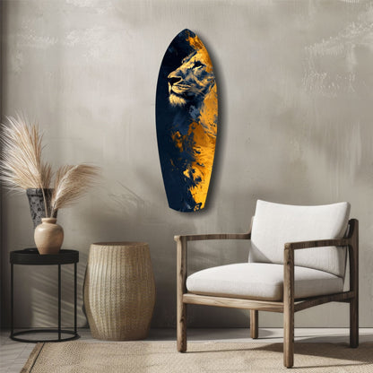 Lion Pride V1 glass wall art in navy and gold displayed above a wooden chair in a minimalist interior setting.