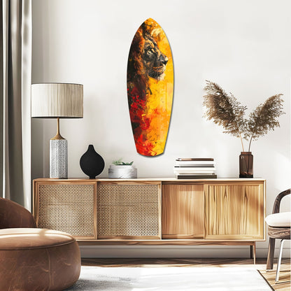 Lion Pride V2 glass wall art displayed above wooden credenza in modern living room interior with warm amber and red tones.