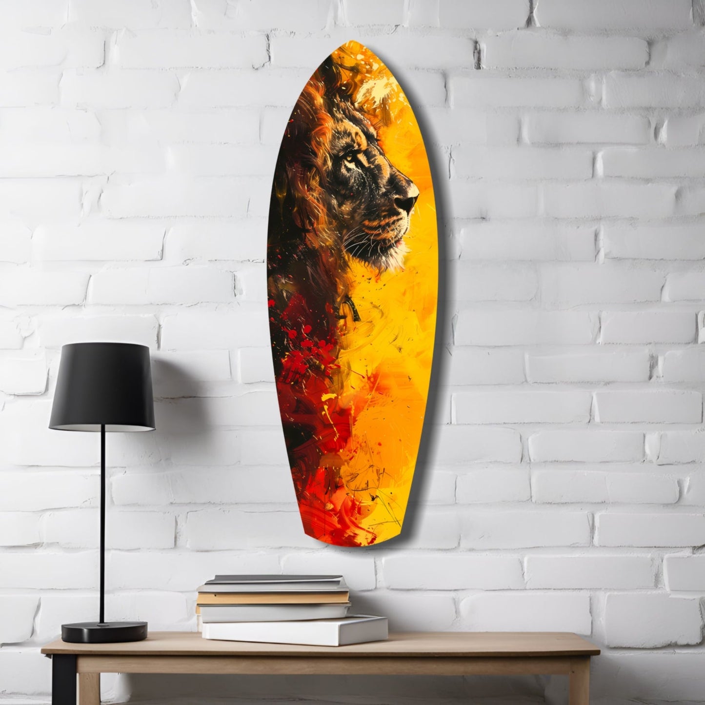 Lion Pride V2 Glass Wall Art in yellow, orange, and red gradient displayed above wooden table with lamp and stacked books.