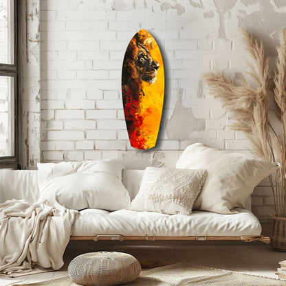 Lion Pride V2 glass wall art displaying a lion's profile in warm yellow, orange, and red hues, hung above a cream bedside bench in a white brick bedroom.