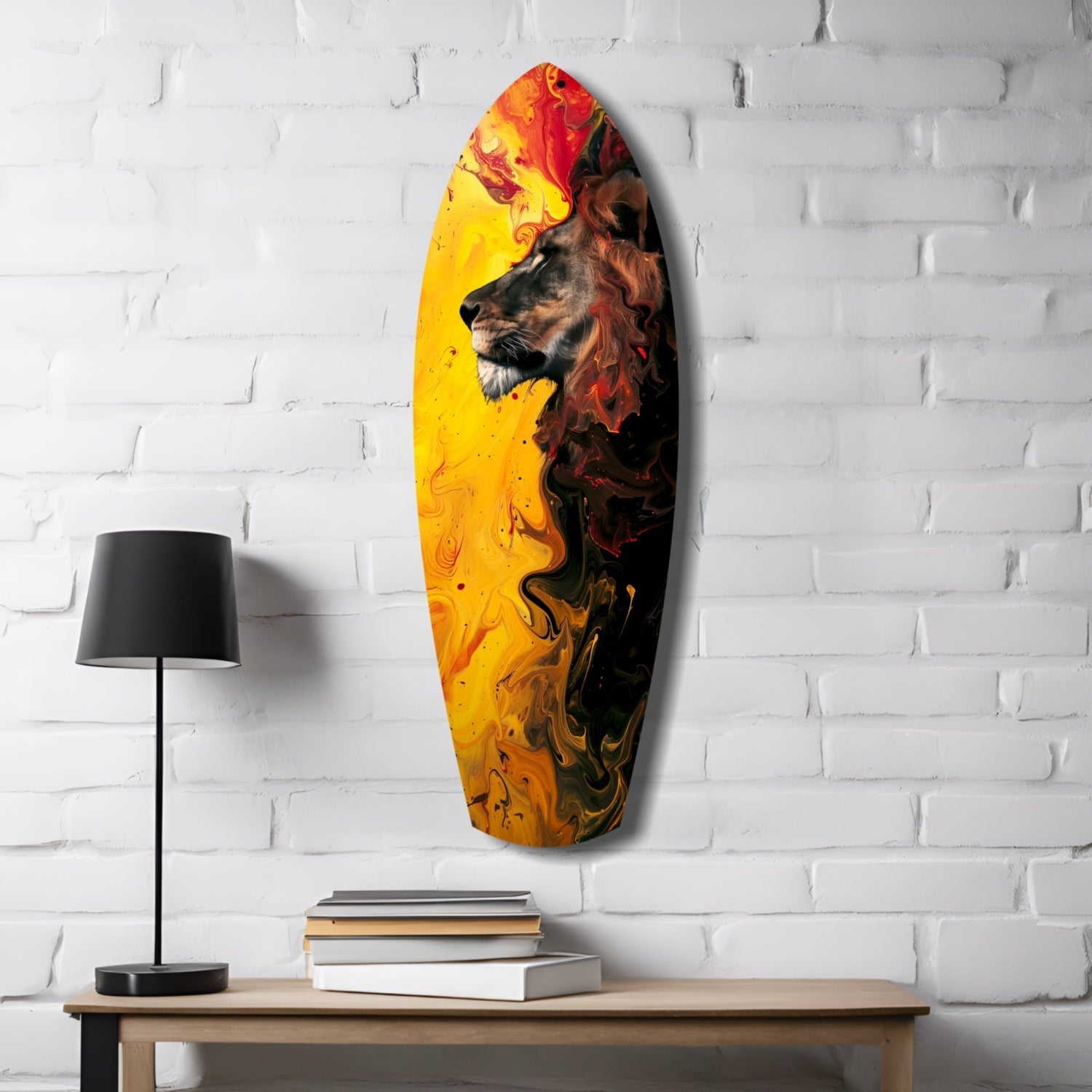 Lion Pride V3 glass wall art displayed on white brick wall above wooden table with lamp and books, featuring lion profile in yellow, orange, and red swirling colors.