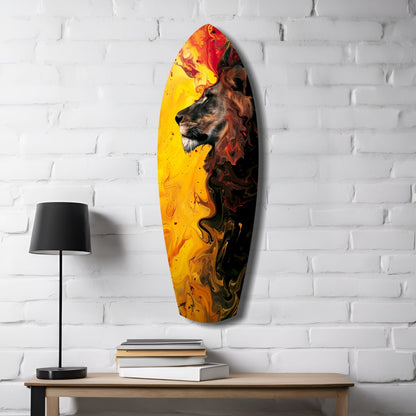 Lion Pride V3 glass wall art displayed on white brick wall above wooden table with lamp and books, featuring lion profile in yellow, orange, and red swirling colors.