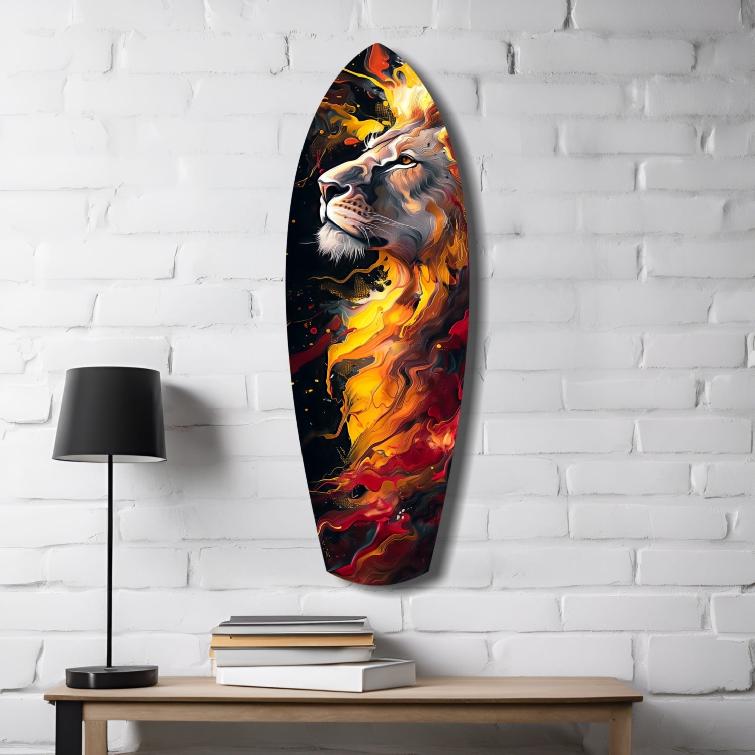 Lion Pride V4 glass wall art mounted on white brick with fiery orange and red flames, displayed above wooden shelf with lamp and books.