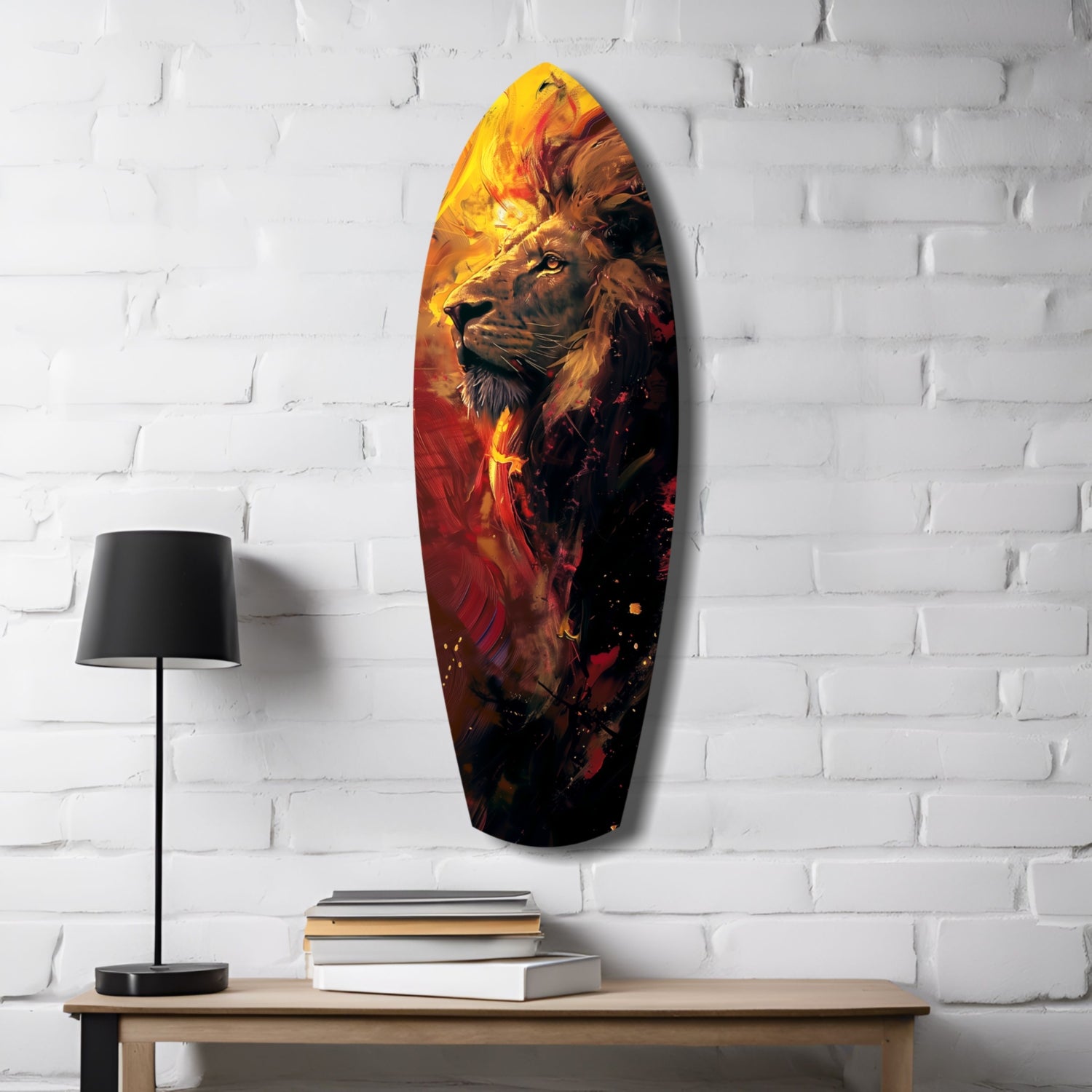 Lion Pride V6 glass wall art mounted on white brick above wooden table with lamp and books, featuring fiery orange and red lion portrait.