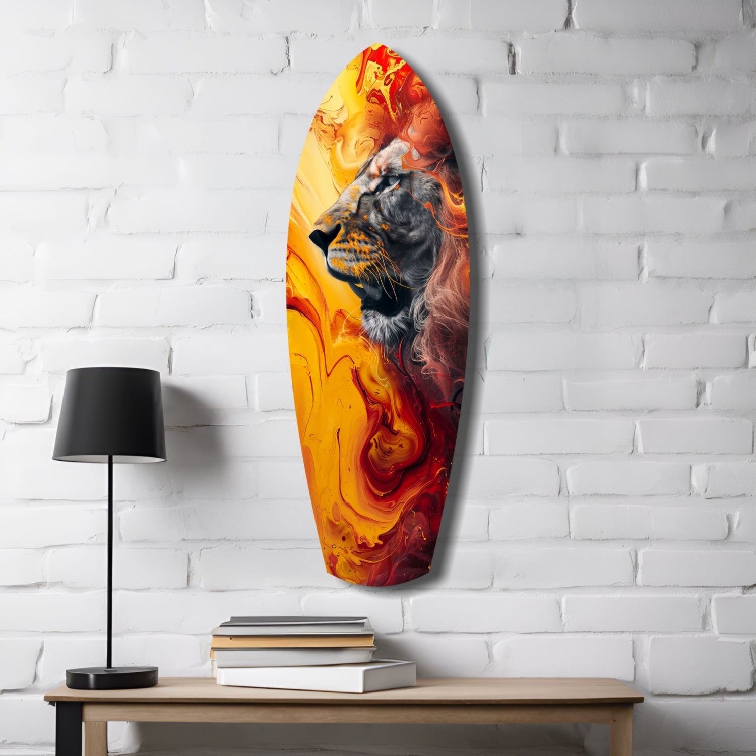 Lion Pride V7 glass wall art mounted on white brick with vibrant orange and red swirled background, displayed above wooden table with lamp and books.