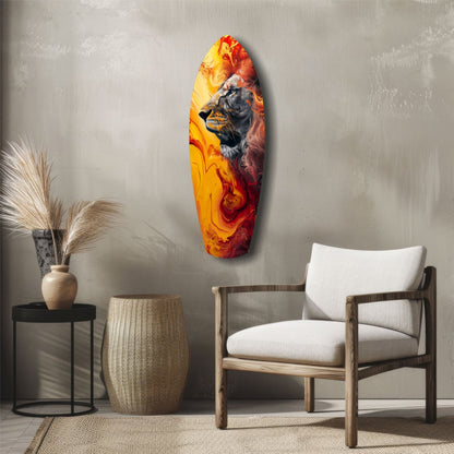 Lion Pride V7 glass wall art with vibrant orange and red flames displayed above a wooden chair in a modern living room setting.