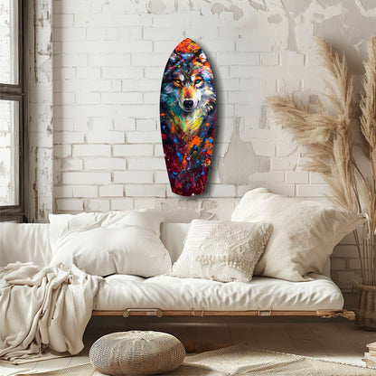 Colorful wolf portrait glass art with vibrant blue, orange, and red hues displayed on white brick wall above cream bedding.