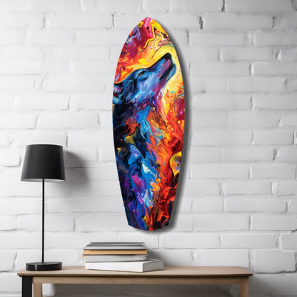 Vibrant abstract glass surfboard art hanging on white brick wall beside wooden table with lamp and books.