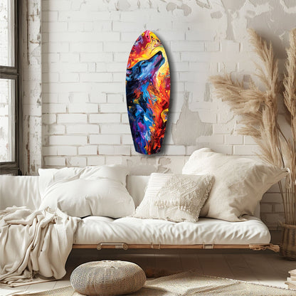 Vibrant multicolored glass art piece with red, yellow, blue, and purple swirls mounted on white brick wall above cream bedding.