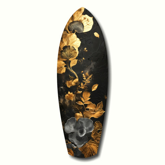 Black glass surfboard panel with gold and silver leaf floral designs, displayed against white background.