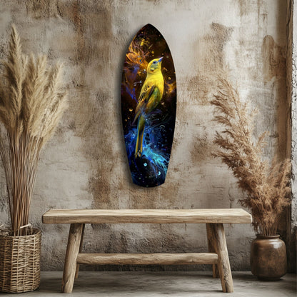Yellow and blue glass bird wall art displayed above a wooden bench against a textured concrete wall with dried grasses.