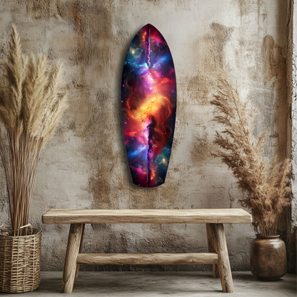 Safrane Space Glass Wall Art hanging above wooden bench, displaying vibrant galaxy imagery in reds, oranges, blues, and purples against textured cream wall with dried grasses.