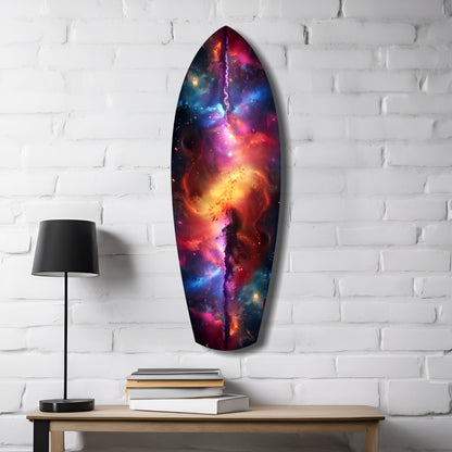 Oval glass wall art with vibrant cosmic nebula design in reds, oranges, purples, and blues, displayed on white brick wall above wooden desk with lamp and books.