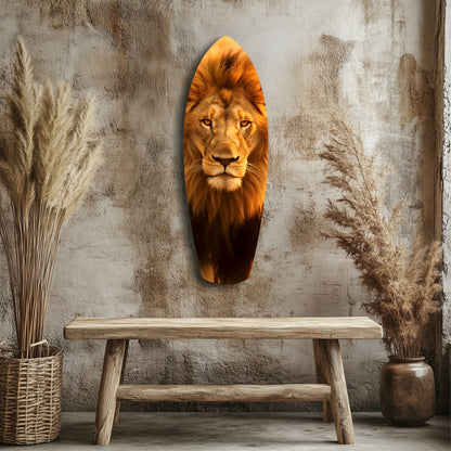 Lion head glass wall art in gold and black tones displayed above wooden bench in rustic interior setting.