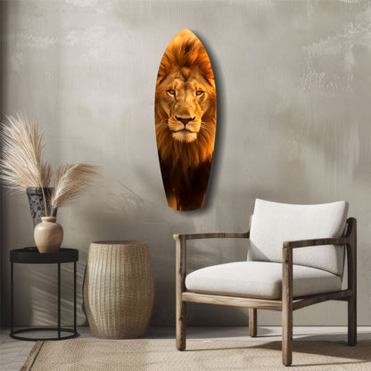 Mr Lion Glass Wall Art displaying a lion's face portrait in golden and brown tones mounted on a gray wall above mid-century furniture.